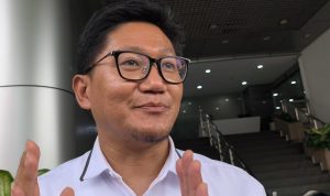 Direktur Pengembangan Ekosistem Digital Direktorat Jenderal Ekosistem Digital Komdigi Sonny Hendra Sudaryana, luruskan isu rating gim IGRS, di Kementerian Komdigi, Jakarta, Senin (6/4/2026). (KOMPAS.com/Rahel)