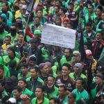 Gabungan ojek online (ojol) dan kurir se-Jabodetabek menggelar unjuk rasa di kawasan Patung Kuda Arjuna Wijaya, Jakarta, Kamis (29/8/2024). (Foto: CNBC Indonesia/Faisal Rahman)